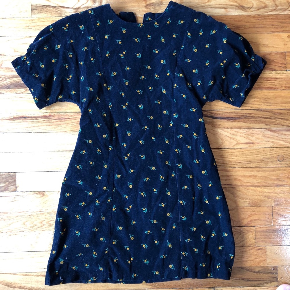 Blue floral corduroy dress by UK brand Olive.